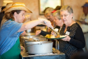 Cowboy-style Dutch oven dinner served riverside before the Sound and Light Show tour