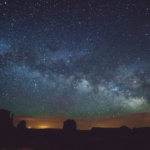 Brilliant night sky over desert canyon in Utah